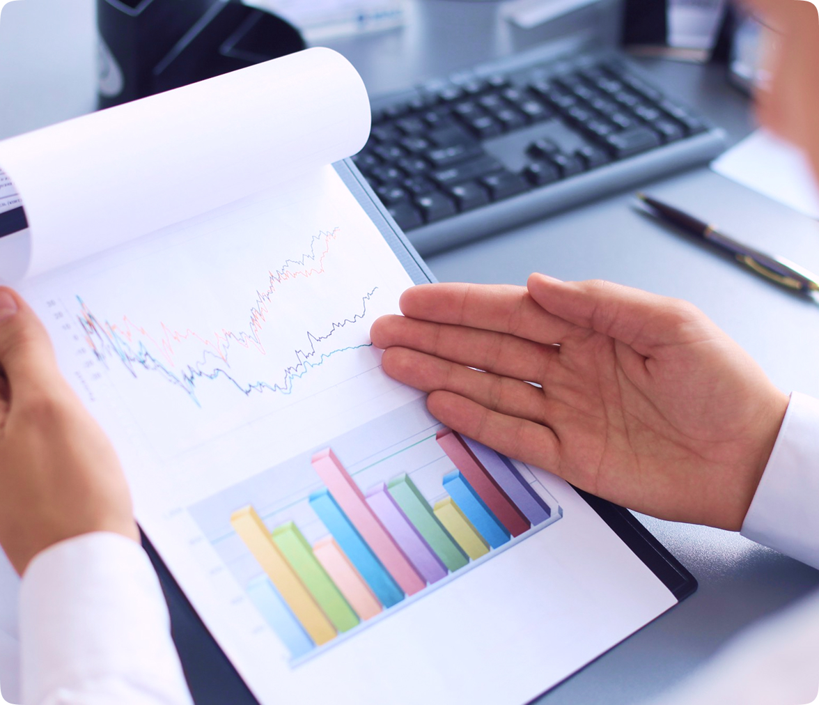 A manager analysing performance charts